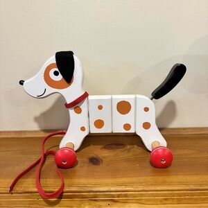 Wooden beagle, dog pool toy, made in France. Very good condition.